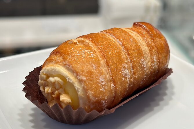 Eating Milan Street Food Tour With Guided Tasting and Sightseeing - Discovering Milans Culinary Traditions