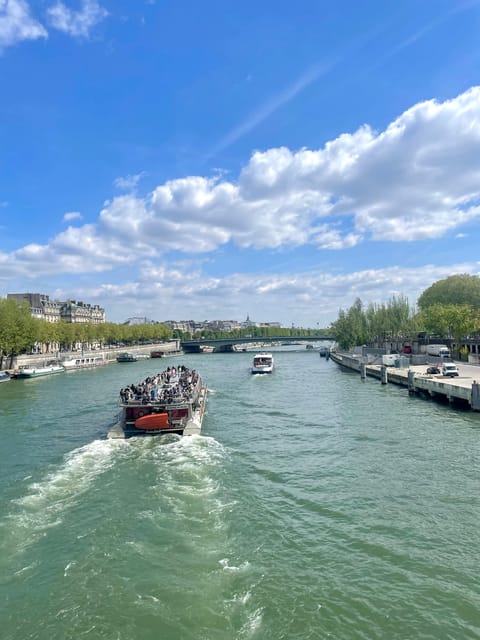 Eiffel Tower History/Curiosities Tour Plus Boat Ride on the Seine River - Cruising Along the Seine River
