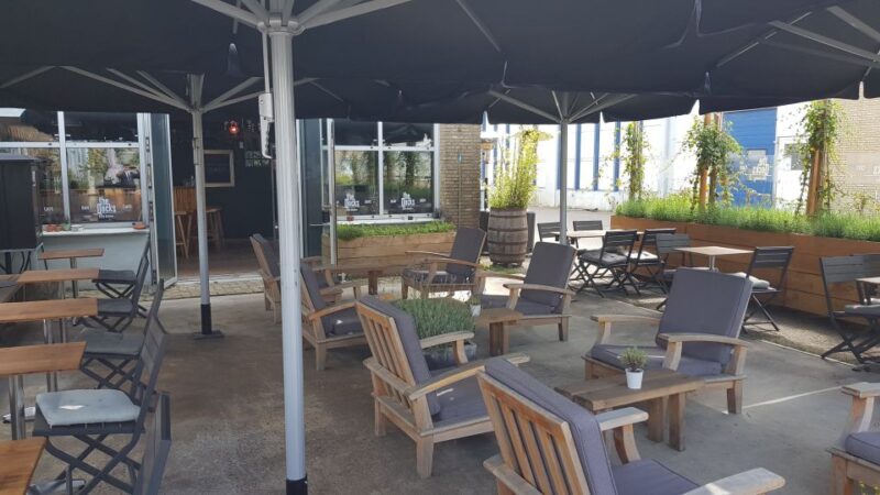 Eindhoven: Bottle Distillery Tour and Tasting Experience - Cozy Tasting Room Atmosphere