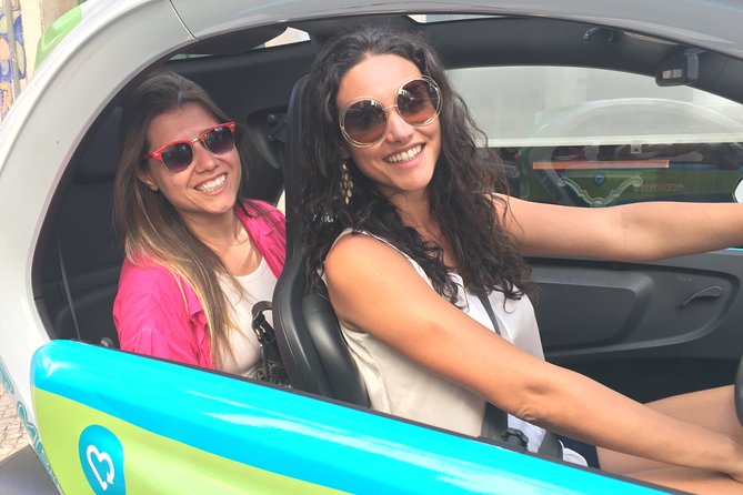 Electric Car With GPS Audio Guide Full Day Tour in Lisbon - Highlights of the Tour