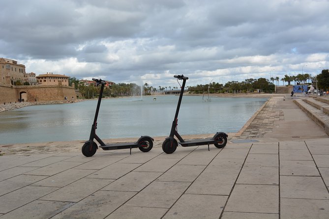 Electric Kick Scooter Rental in Palma De Mallorca - Safety Precautions and Helmet Availability