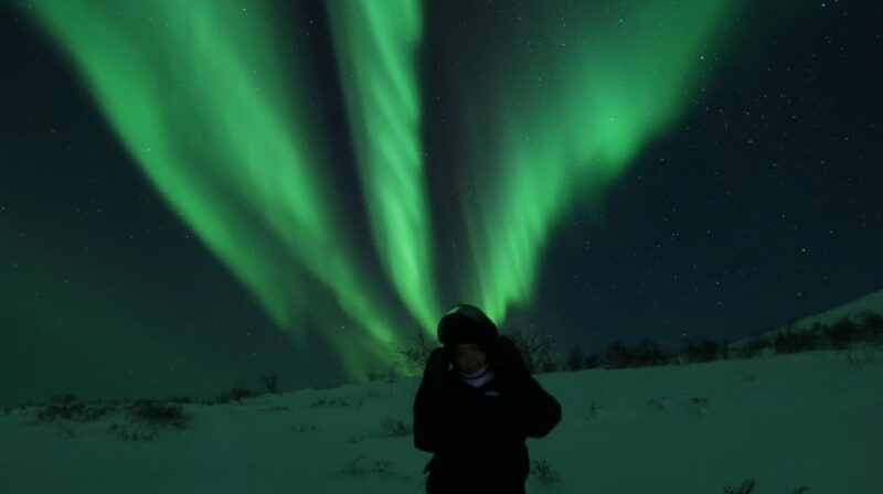 Enjoy the Aurora Show on Top of the Mountain Inc Tipi Dinner - Snowmobile Ride to Mt. Ednamvårr