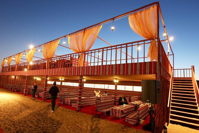Evening Desert Safari Dubai With Buffet, Dune Bashing, Camel Riding, and Tanura - Dune Bashing and Camel Riding