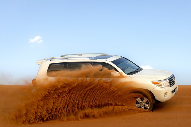 Evening Desert Safari in Dubai, Sandboard & BBQ Dinner - Thrilling Dune Bashing Experience