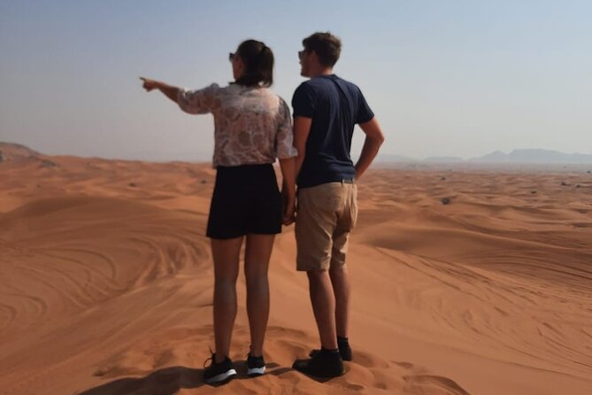 Evening Desert Safari in Dubai With Dune Bashing , Camel Ride and BBQ Dinner - Camel Ride and Sand Boarding