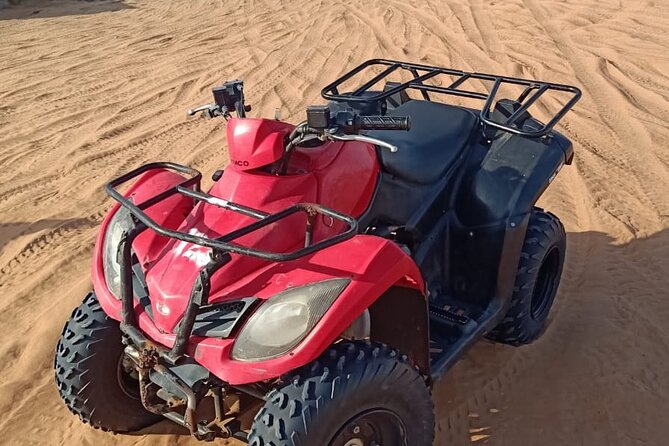 Evening Desert Safari With BBQ Buffet Camel Ride and Arabic Shows - ATV Riding Experience