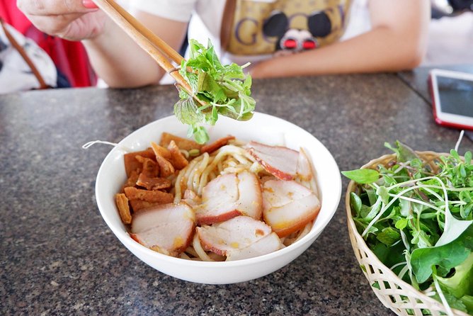 Evening Walking Food Tour in Hoi An - Lantern Boat Ride and Games