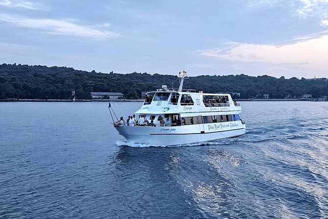 Exclusive Dolphin & Sunset Cruise With Dinner & Drinks From Pula - National Park Visit