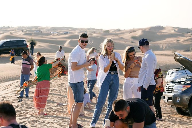 Exclusive Sunrise Desert Safari With Camel Ride Sand Boarding Dune Bashing - Tips for Travelers