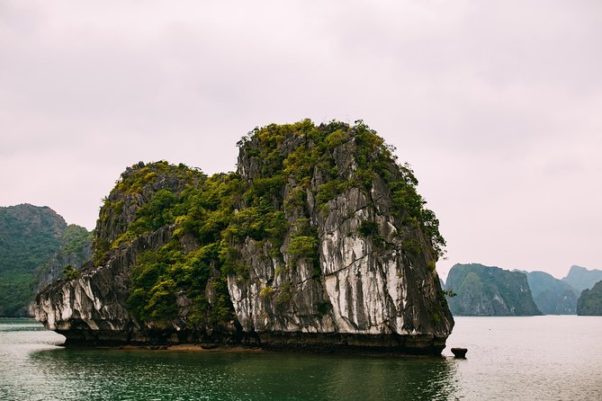 Excursion to Ha Long Bay With Titop Island and Kayaking in Luon Cave - Luxury Cruise Option