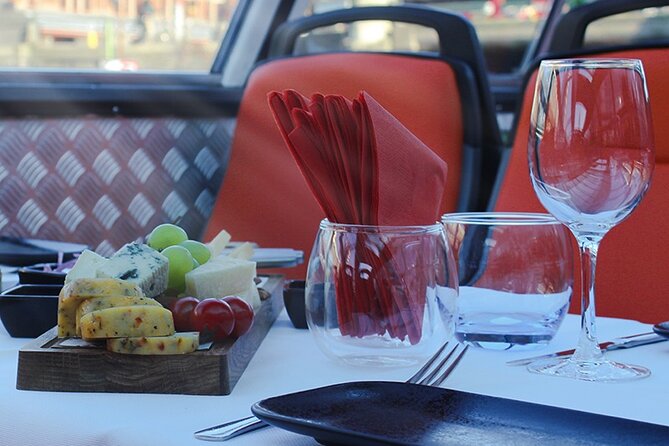 Experience Amsterdam Nightlife on Canal Cruise With Cheese & Wine - Key Points