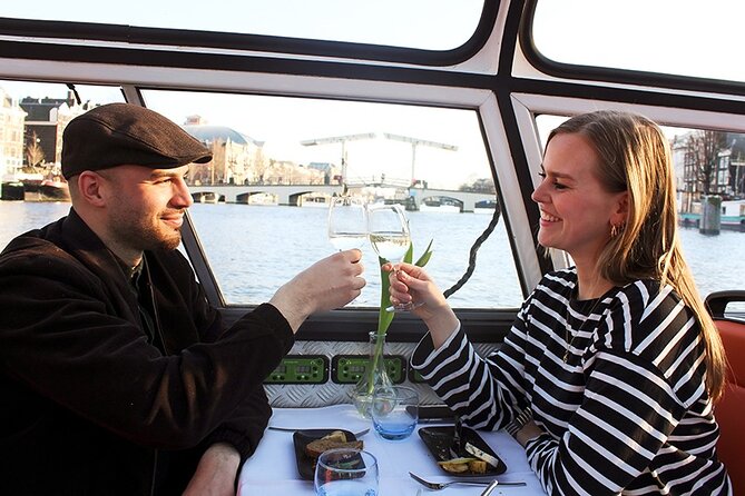 Experience Amsterdam Nightlife on Canal Cruise With Cheese & Wine - Beverage Options for the Cruise