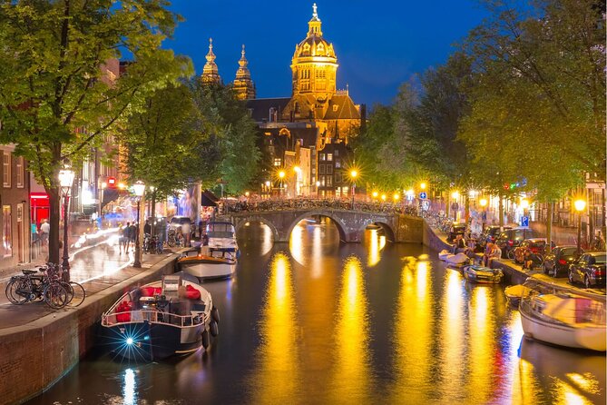 Experience Amsterdam Nightlife on Canal Cruise With Cheese & Wine - Booking Confirmation and Meeting Details