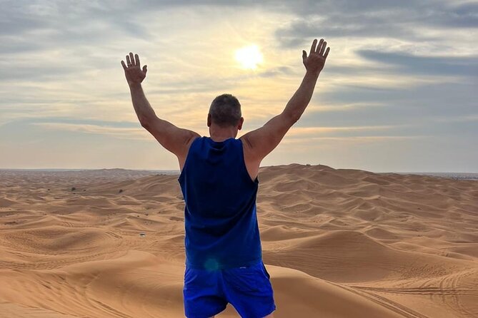 Experience Dubai Best Red Dune Evening Desert Safari BBQ Dinner - Dune Bashing and Sunset Photography
