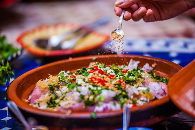 Experience Marrakech: Visit Market and Cook Traditional Tajine - Exploring Djemaa El-Fna Square