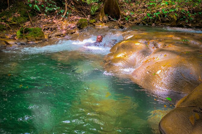 Explore 2 Hidden Water Falls and Caves With Limestone Massage - Pricing and Inclusions