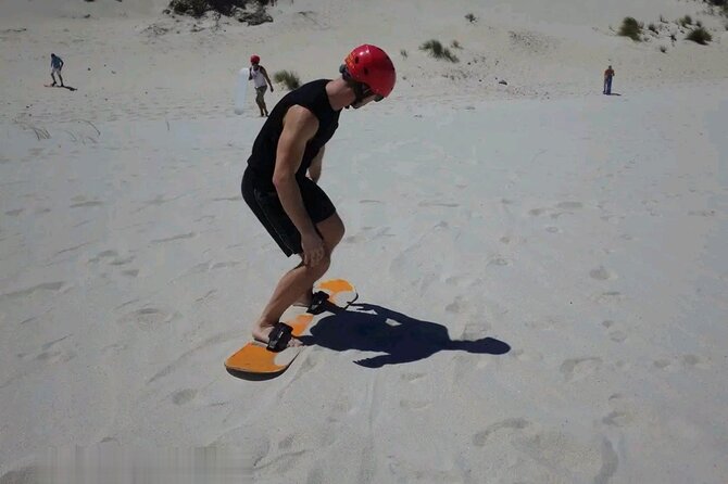 Explore Atlantis Sand Dunes With a 1hour 30MINS Sandboarding Tour - Key Points