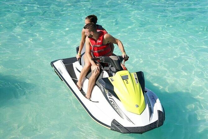 Explore Seven Mile Beach Your Way with Jet Ski Experience - Key Points