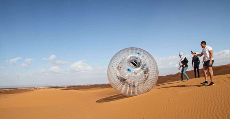 Extreme Adventure With Harness Zorbing in Merzouga Dunes - Key Points