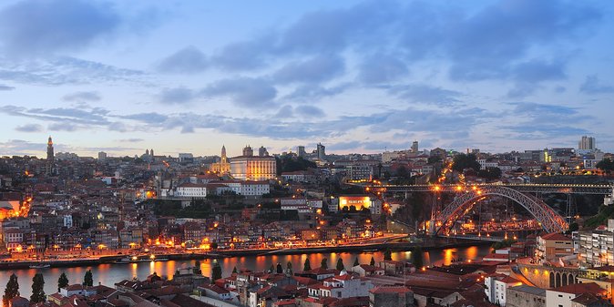 Fado Dinner Show and Night Lights Tour in Porto - Pricing and Booking Details