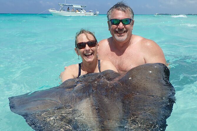 (Family owned) Stingray city sandbar, Starfish Beach & Snorkeling - An Authentic Grand Cayman Experience