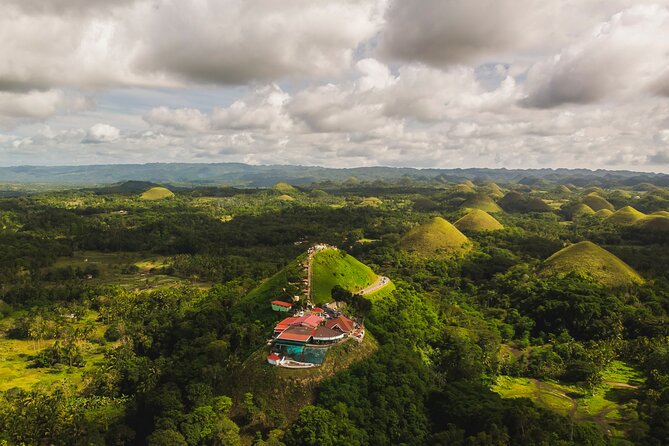 Famous Bohol Chocolate Hills Loboc River Cruise Tarsier Tour - Blood Compact Monument