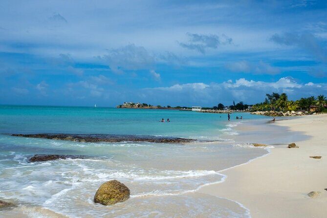 Famous Red Phone Booth Beach (Dickenson Bay) and Fort Bay Beach - A Closer Look at the Tour Experience