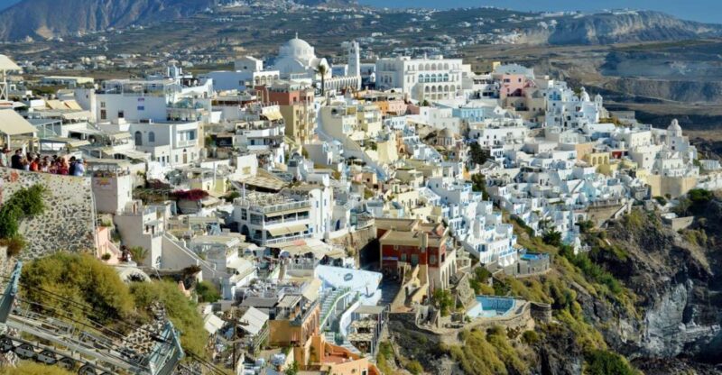 Fira: Walking Tour With Cable Car Ride - Guided Walking Experience