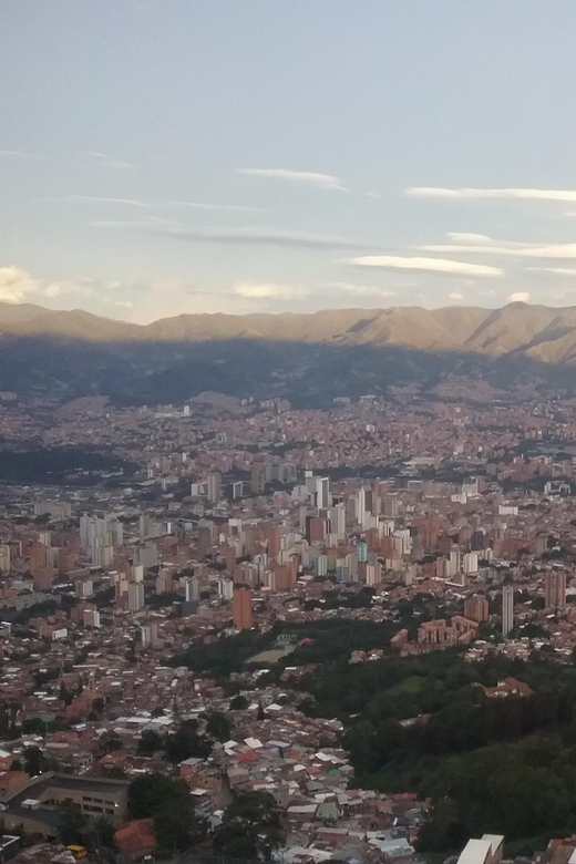 Fly Over Medellín in the Metro Cable Ride, Downtown and Communes. - Cultural and Historical Exploration
