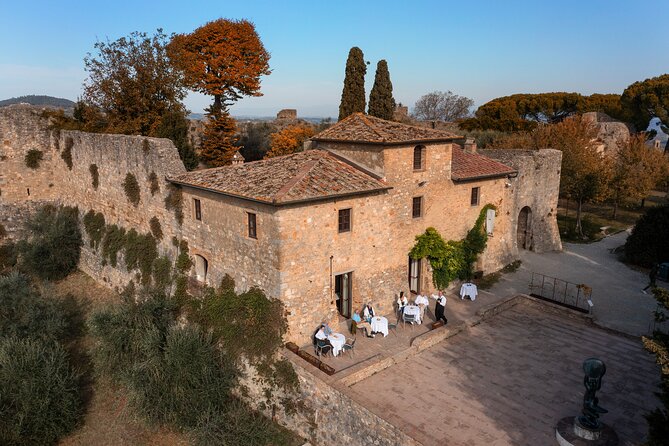 Food and Wine Lesson and Wine Tasting in San Gimignano - Bottled Water and Pickup