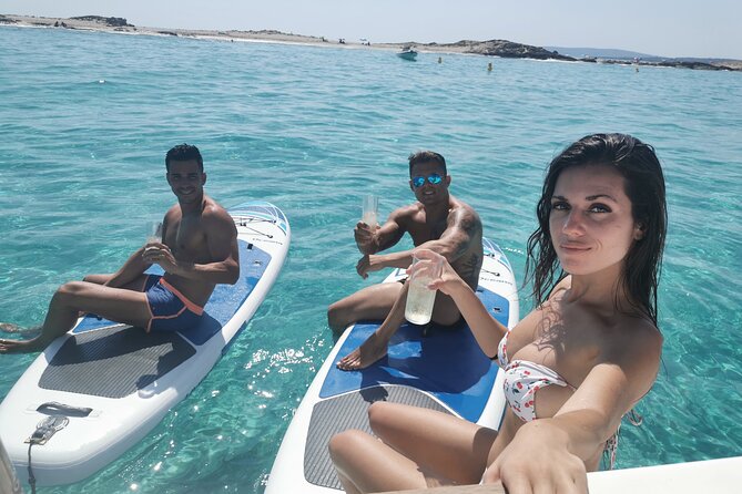 Formentera & Ibiza Small Group Trip by Catamaran - Sunbathing on Deck