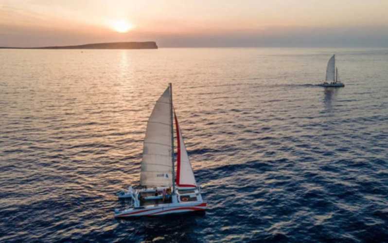 Fornells: Catamaran Sunset Cruise of Menorcas Coast - Onboard Experience