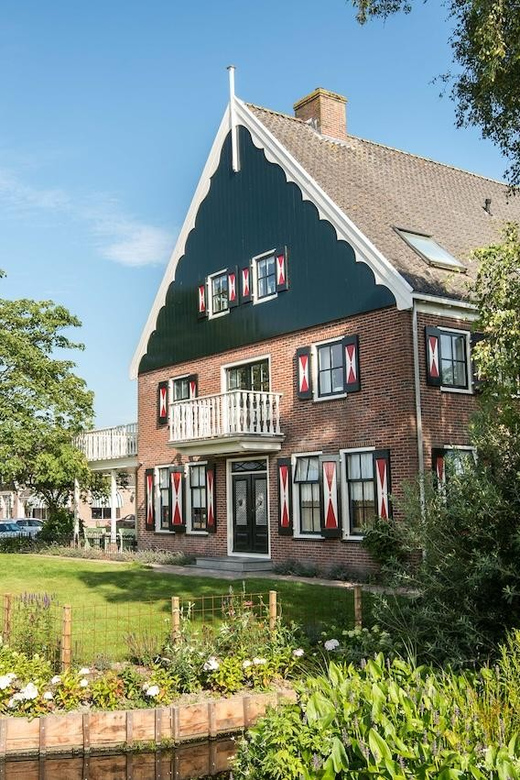 From Amsterdam; Alkmaar Cheese Market, Canal Cruise + Farm - Highlights