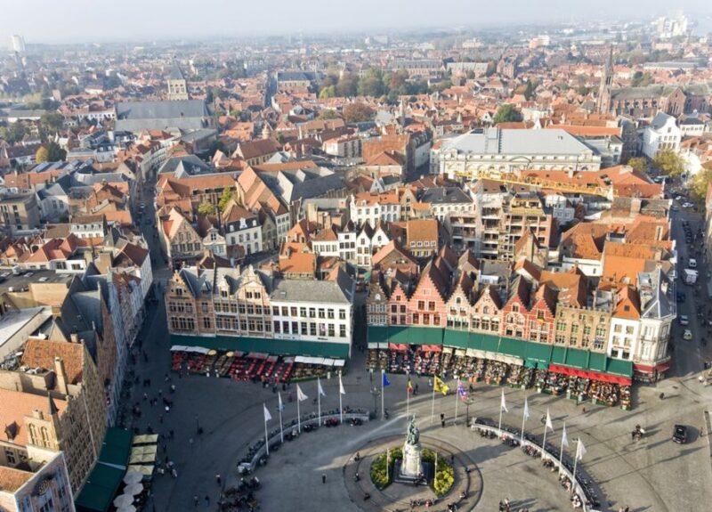 From Amsterdam: Day Trip to Bruges in Spanish or English - Guidance and Language Options