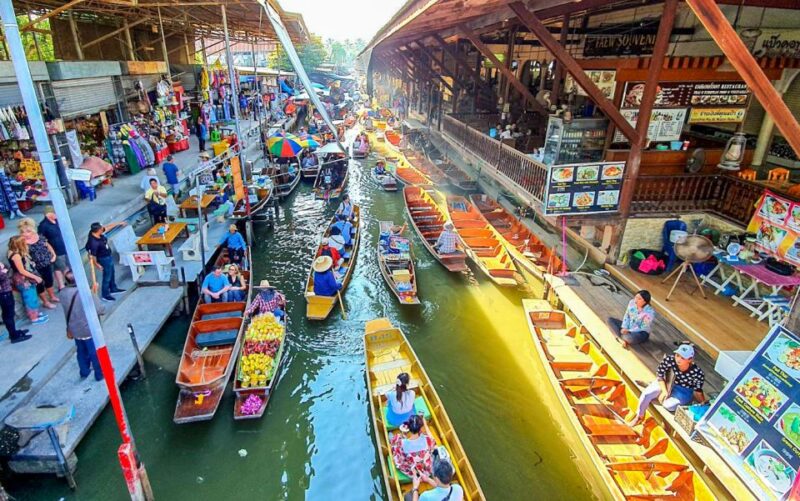 From Bangkok: Damnoen Saduak & Train Market Tour in Spanish - Key Points