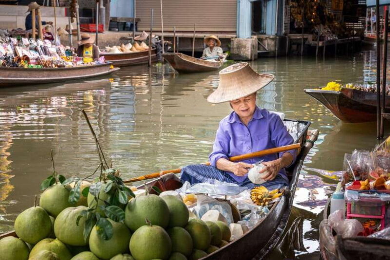 From Bangkok: Railway & Damnoen Saduak Floating Market Tour - Visiting the Lao Tuk Luck Market