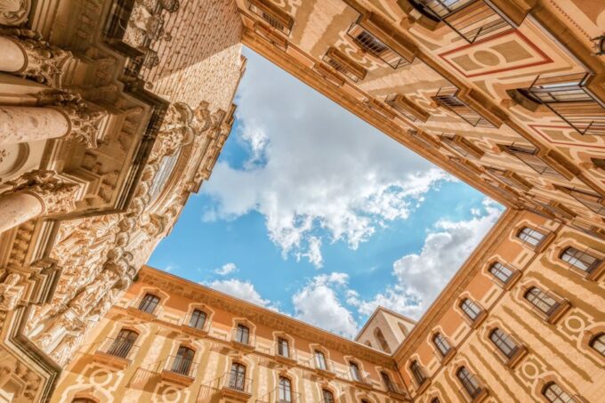 From Barcelona: Montserrat Guided Tour & Return Bus Transfer - Exploring Montserrat Mountain Range