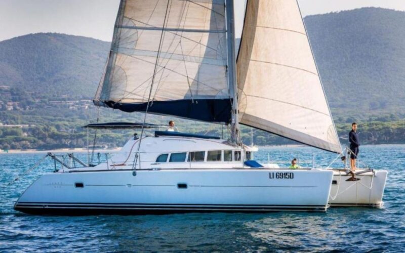 From Cannigione: Catamaran Tour Among La Maddalena Islands - Booking and Cancellation