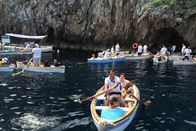 From Capri: Visit the Island With a Chairlift Tour at 10,25 - Faraglioni Cliff Exploration