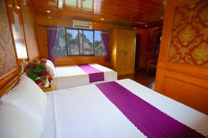 From Cat Ba : 2-Day Lan Ha Bay Cruise Guide Tour With Meal - Sunset Party and Squid Fishing