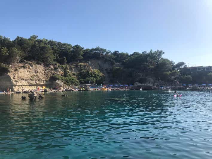 From Faliraki: Rhodes Sunset Cruise With Swimming and Snacks - Inclusions