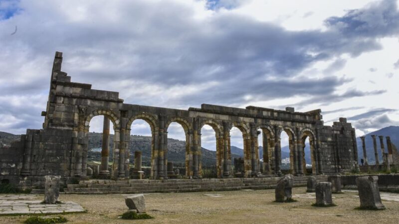 From Fes: Meknes Volubilis and Moulay Idriss Day Trip - Exploring Volubilis Roman Ruins