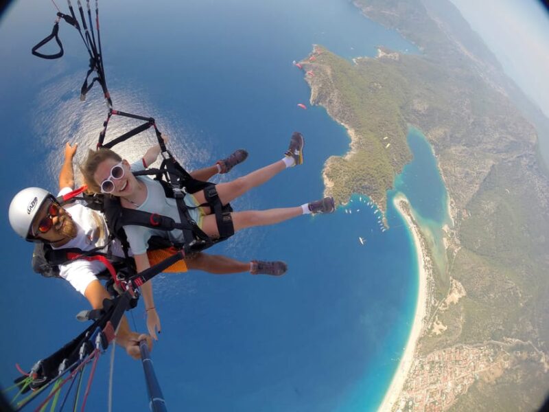 From Fethiye: Blue Lagoon Tandem Paragliding - Transportation and Group Size