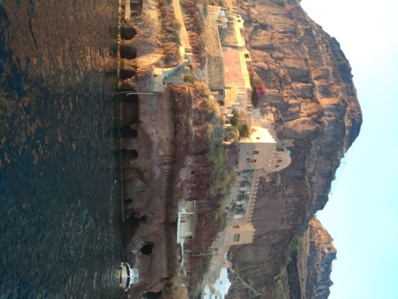 From Fira and Oia: Santorini Caldera Cruise by Private RIB - Admiring the Elephant Skin Rocks