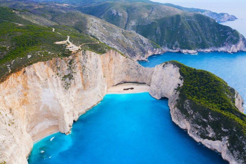 From Kefalonia: Blue Cave Boat Cruise & Shipwreck Photo Stop - Itinerary