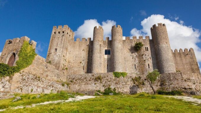 From Lisbon: Fatima, Nazaré, Óbidos Full-Day Trip - Touring Batalha Monastery