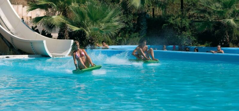 From Mallorca: Aqualand and Arenal Tickets and Transfer - Live Tour Guide Options
