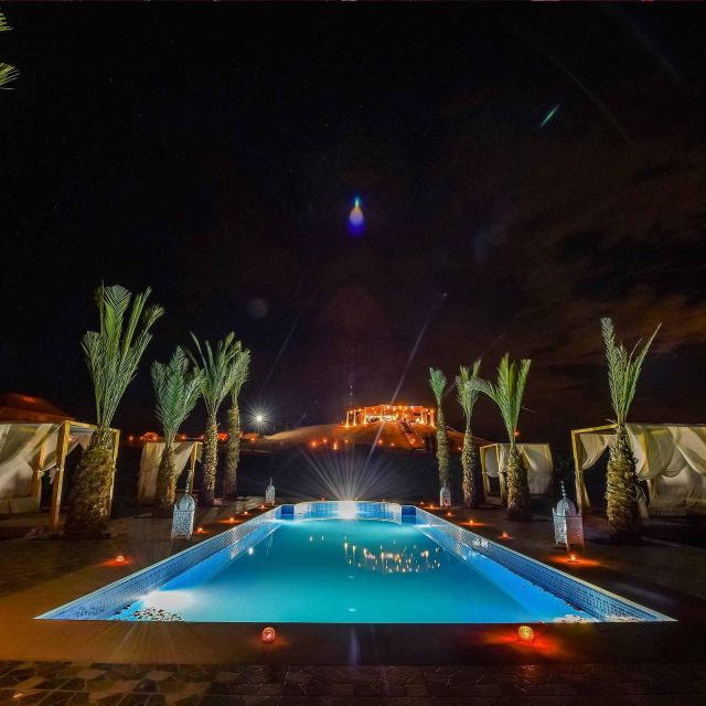 From Marrakch Agafay Desert Night Show With Dinner Camel Rid - Dinner, Music, and Stargazing