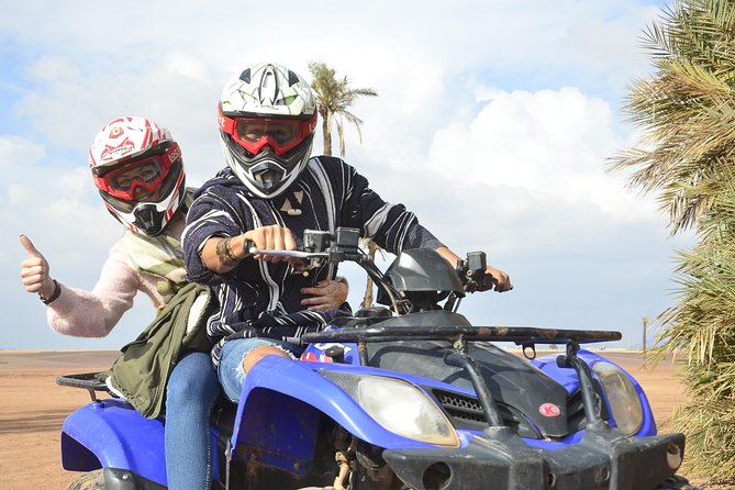 From Marrakech: Palm Grove Quad Bike and Camel Ride Tour - Camel Ride Experience