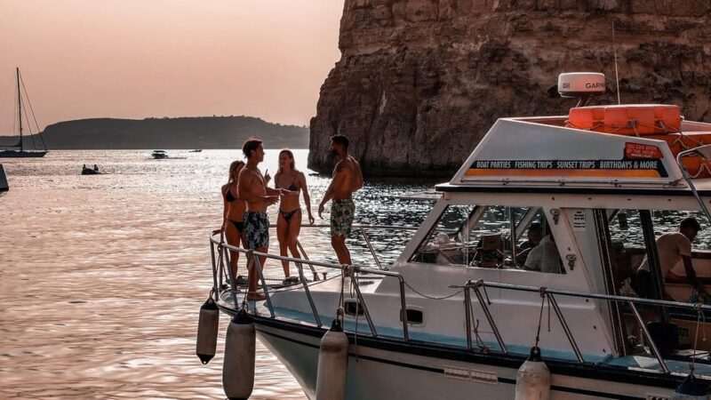 From Mellieha: Round Comino Cruise With Wine and Water - Onboard Activities